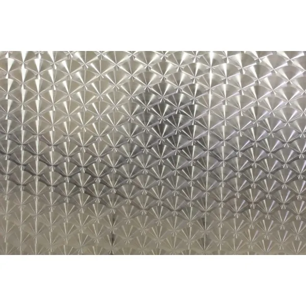 ÉCHANTILLON DE TOLE INOX BOUCHONNÉE
